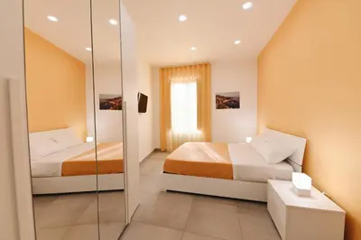 Letto o letti in una camera di Dimora Roccamena