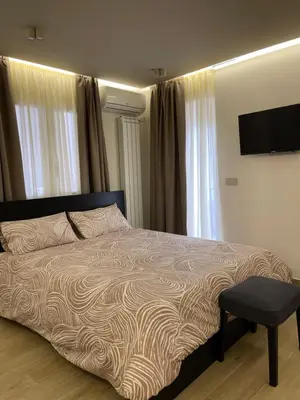 Letto o letti in una camera di Élite Etnea