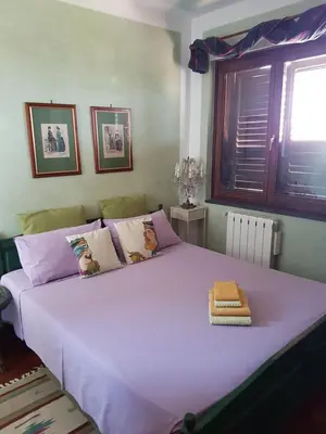 Letto o letti in una camera di Casa Delle Coccole