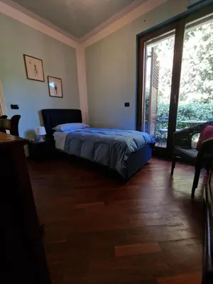 Letto o letti in una camera di Casa Delle Coccole