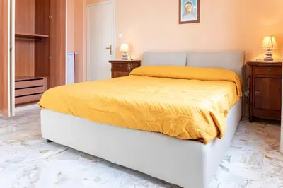Letto o letti in una camera di Carlo's Charm Residence Acireale