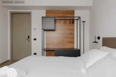 Letto o letti in una camera di Belladonna Hotel