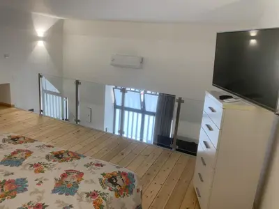 Letto o letti in una camera di Binario82