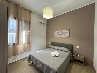 Letto o letti in una camera di Casabella