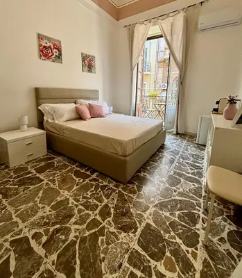 Letto o letti in una camera di Casa MiRè