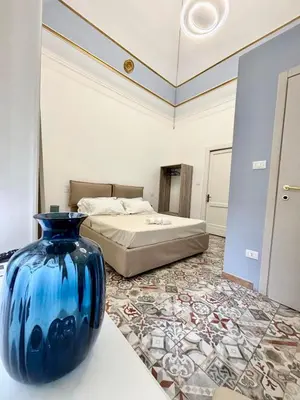 Letto o letti in una camera di Casa MiRè