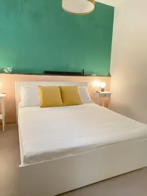 Letto o letti in una camera di Delia’s Apartments