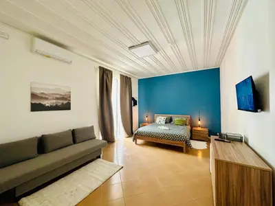 Area soggiorno di Sicilian Vibes Rooms With Suite