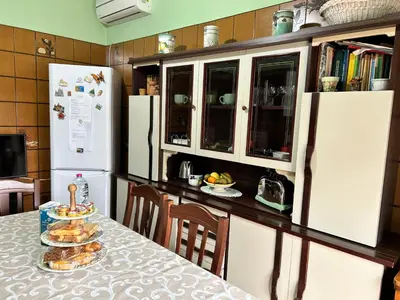 Cucina o angolo cottura di Casa Etna Sea immersa nel verde a 5 min a piedi dal mare tra Etna & Taormina