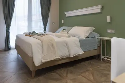 Letto o letti in una camera di Gigli Rooms