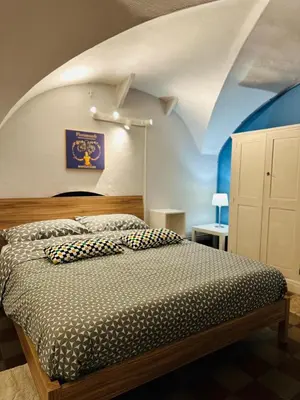 Letto o letti in una camera di Sicilian Vibes Flat in Palazzo Storico