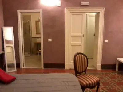 Letto o letti in una camera di Domoikos
