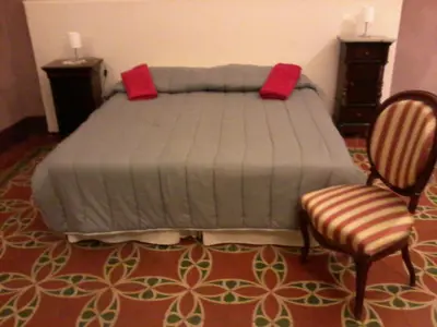 Letto o letti in una camera di Domoikos