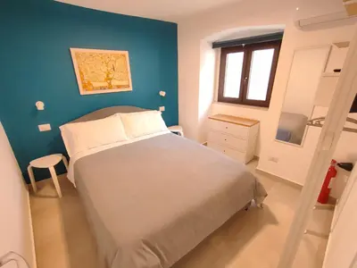 Letto o letti in una camera di Tophouse Catania Centro - Blue Apt