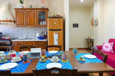 Cucina o angolo cottura di Casa Aurora a due passi dalla ferrovia