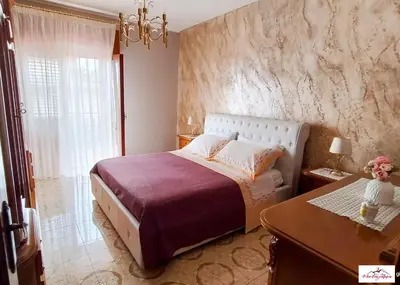 Letto o letti in una camera di Casa Montegrappa - tra Etna e Mare Parcheggio gratuito