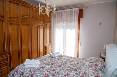 Letto o letti in una camera di Casa Montegrappa - tra Etna e Mare Parcheggio gratuito