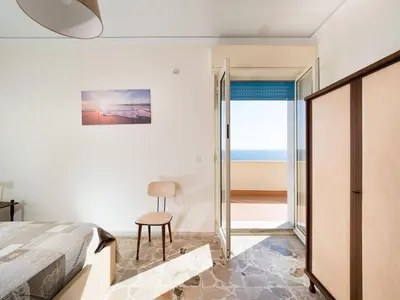 Letto o letti in una camera di Casa Nettuno