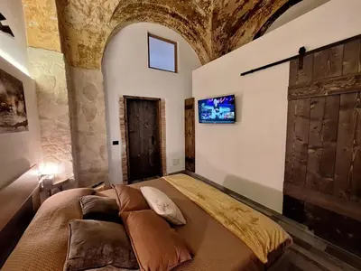 Letto o letti in una camera di Giangi Rustic House