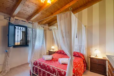 Letto o letti in una camera di La Vecchia Torre - Villa panoramica in Collina