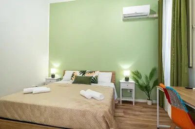 Letto o letti in una camera di Luni Apartment Catania centro