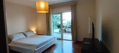 Letto o letti in una camera di Pirandello Apartment Acitrezza