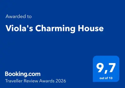 Certificato, attestato, insegna o altro documento esposto da Viola's Charming House