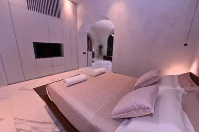 Letto o letti in una camera di Suite al centro storico