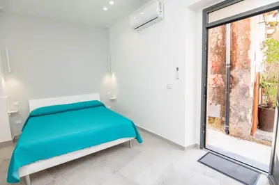 Letto o letti in una camera di Al Vicolo
