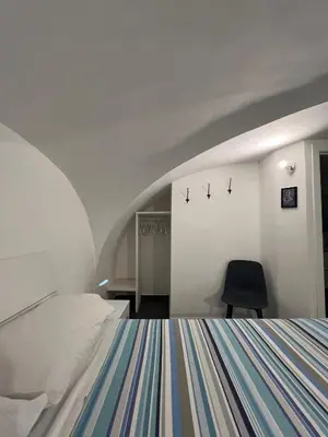 Letto o letti in una camera di G House