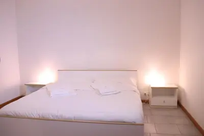 Letto o letti in una camera di La Torre guest house