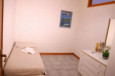 Letto o letti in una camera di La Torre guest house