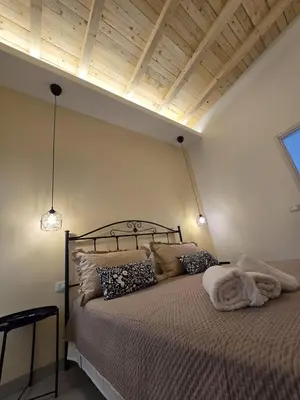 Letto o letti in una camera di Fortino living winter