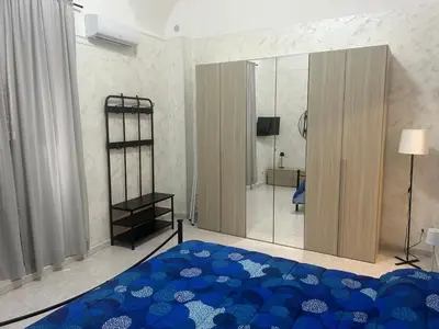 Letto o letti in una camera di Baiocco house