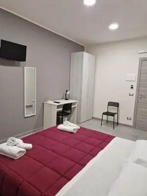 Letto o letti in una camera di B&B Sei Palme