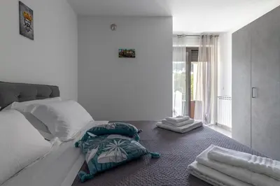 Letto o letti in una camera di Beatrice's House