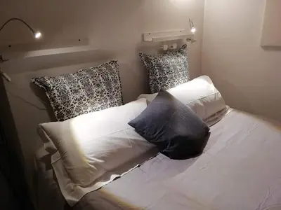 Letto o letti in una camera di Lalli's Flat