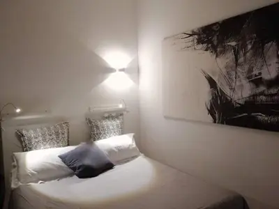 Letto o letti in una camera di Lalli's Flat