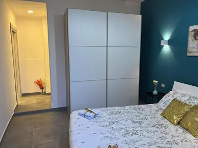 Letto o letti in una camera di Leoscar Apartment in Catania center Self Check-in