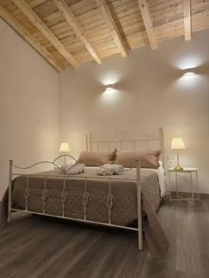 Letto o letti in una camera di Fortino living fall