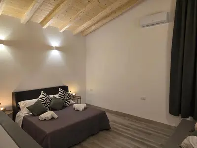 Letto o letti in una camera di Fortino living spring
