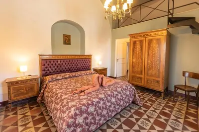 Letto o letti in una camera di Villa Franca La Casina