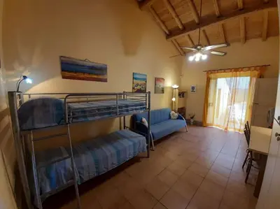 Letto o letti in una camera di CASA PRAIOLA Tangerine's House by the SEA