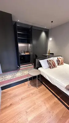Letto o letti in una camera di Berht - Appartamenti al centro di Catania