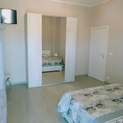 Letto o letti in una camera di Mati Rooms