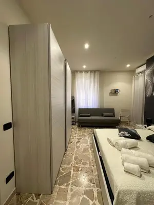 Letto o letti in una camera di Sotto l'Arco