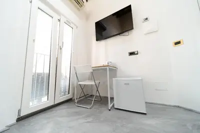 TV o dispositivi per l'intrattenimento presso VOLCANO'S SUITE - UVA - The First Sustainable Eco - Chic Suite in Sicily - Room