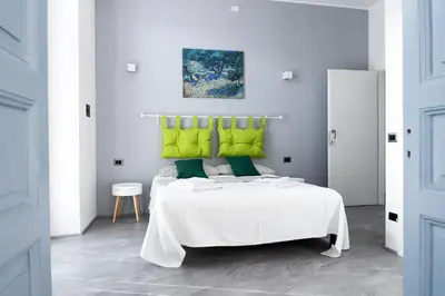 Letto o letti in una camera di VOLCANO'S SUITE - ULIVO - The First Sustainable Eco - Chic Suite in Sicily