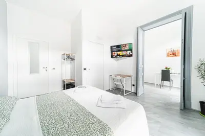 Letto o letti in una camera di VOLCANO'S SUITE - ULIVO - The First Sustainable Eco - Chic Suite in Sicily