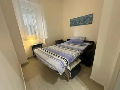 Letto o letti in una camera di Seacily Apartments
